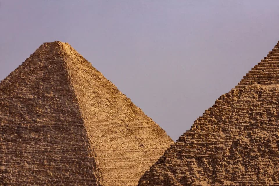 Two pyramids at Giza under a clear sky in Egypt