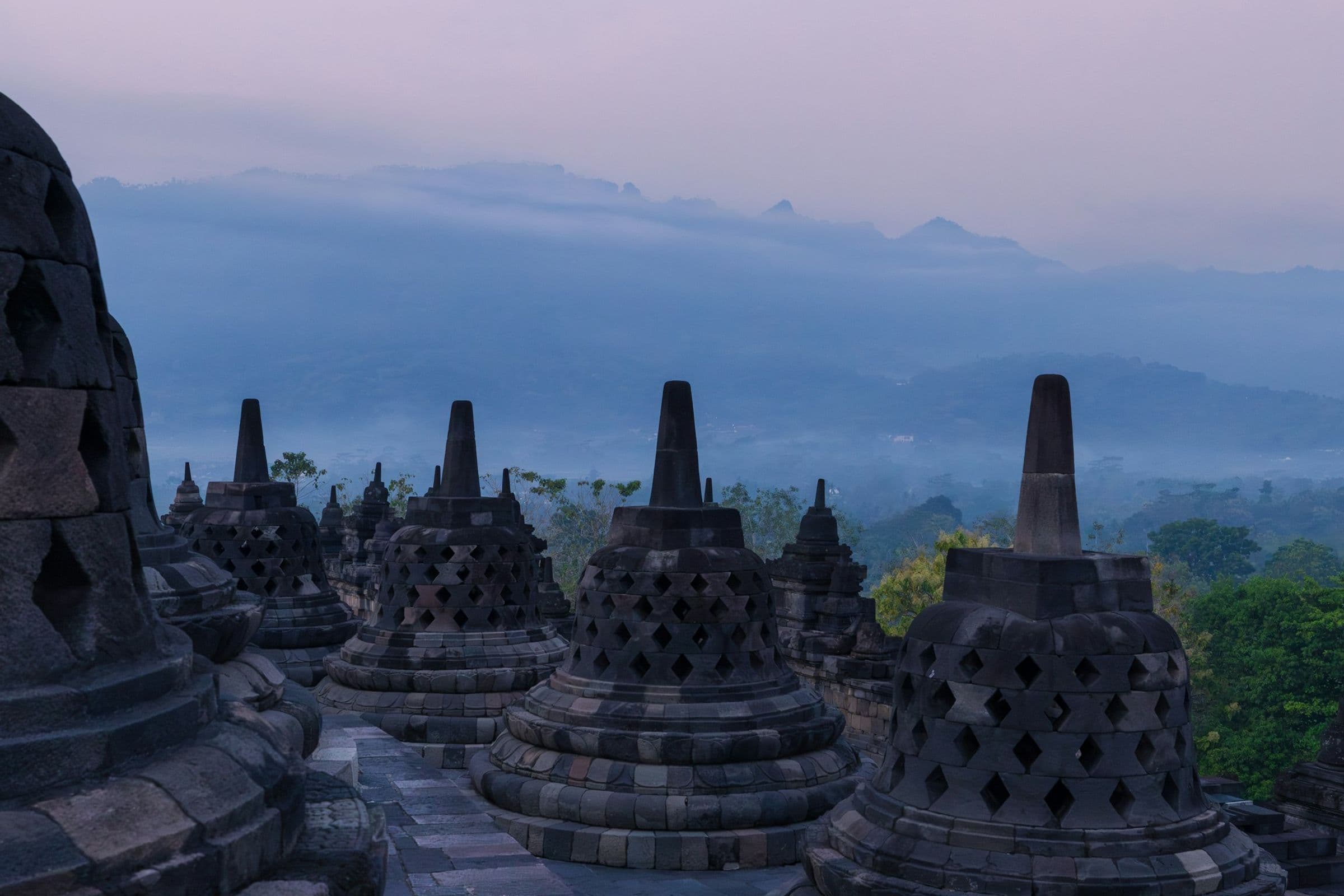 Borobudur temple stupas at dawn in Central Java, Indonesia