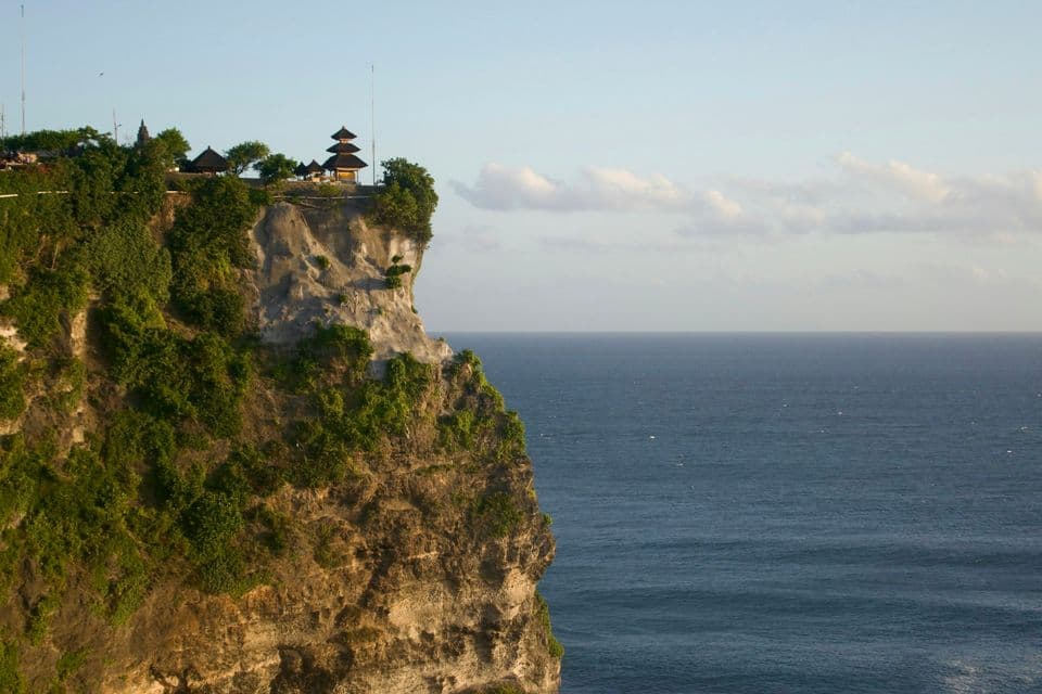 Uluwatu Temple on a cliff above the Bali coast